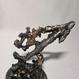 Sculpture de Philippe Buil représentant le signe astrologique du Sagittaire en dentelle de métal. Symbole de la  soif de découverte et l'optimisme du signe du Sagittaire.