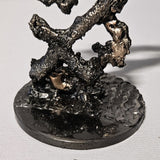 Sculpture de Philippe Buil représentant le signe astrologique du Sagittaire en dentelle de métal. Symbole de la  soif de découverte et l'optimisme du signe du Sagittaire.