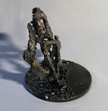 Sculpture de Philippe Buil qui représente le symbole de l'eau à travers la dentelle de métal (Acier et Bronze)