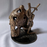 Sculpture de Philippe Buil représentant une silhouette canine stylisée orné du logo emblématique YSL en dentelle de bronze.