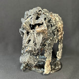 Sculpture contemporaine d'un rhinocéros en dentelle de métal acier et bronze par l'artiste sculpteur Philippe Buil vue de face