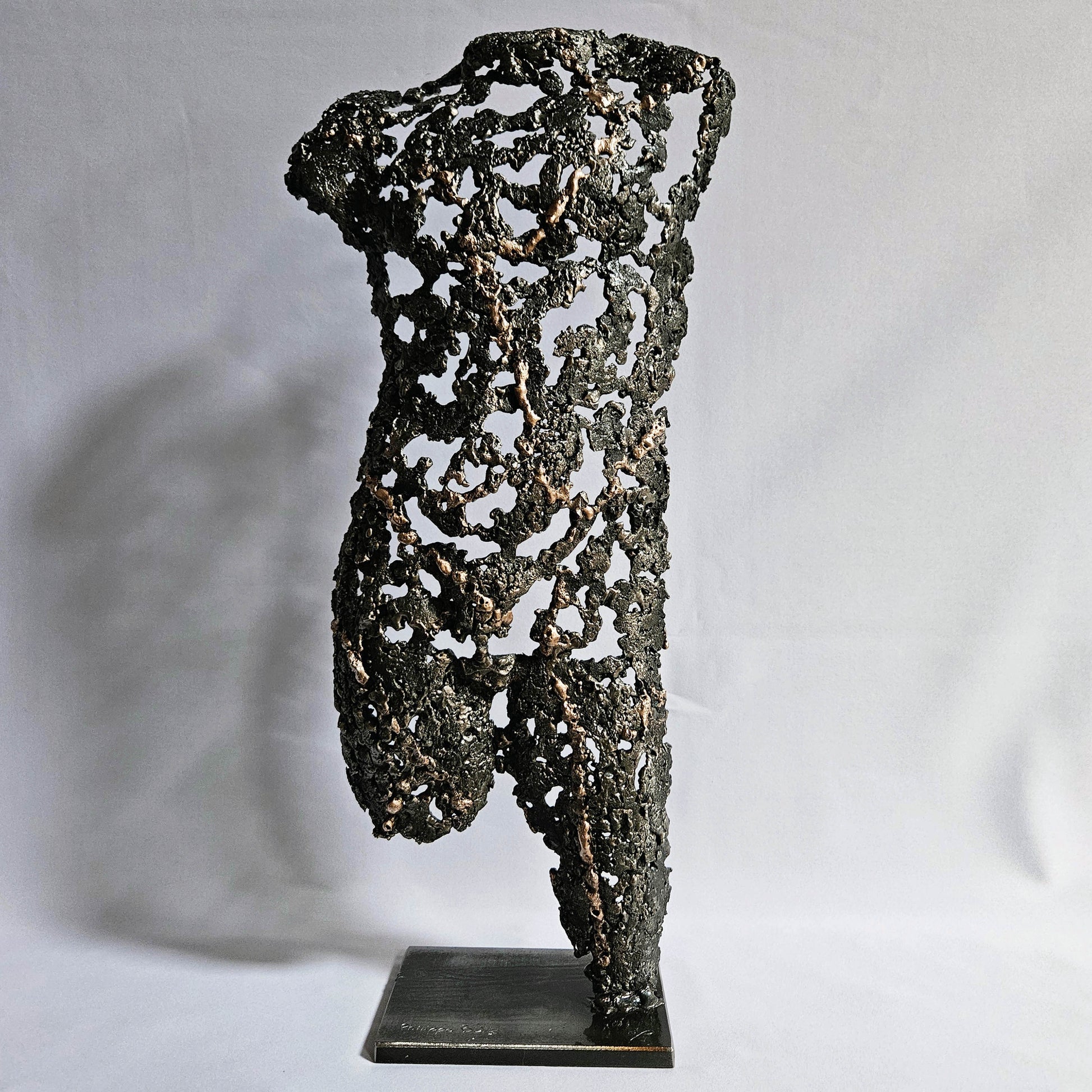 Sculpture figurative corps masculin en acier et bronze