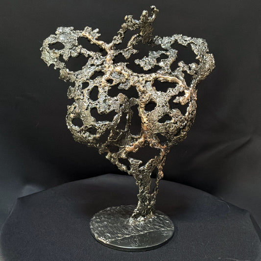 Sculpture corps féminin métal Pavarti Éclosion en acier et bronze par Philippe Buil