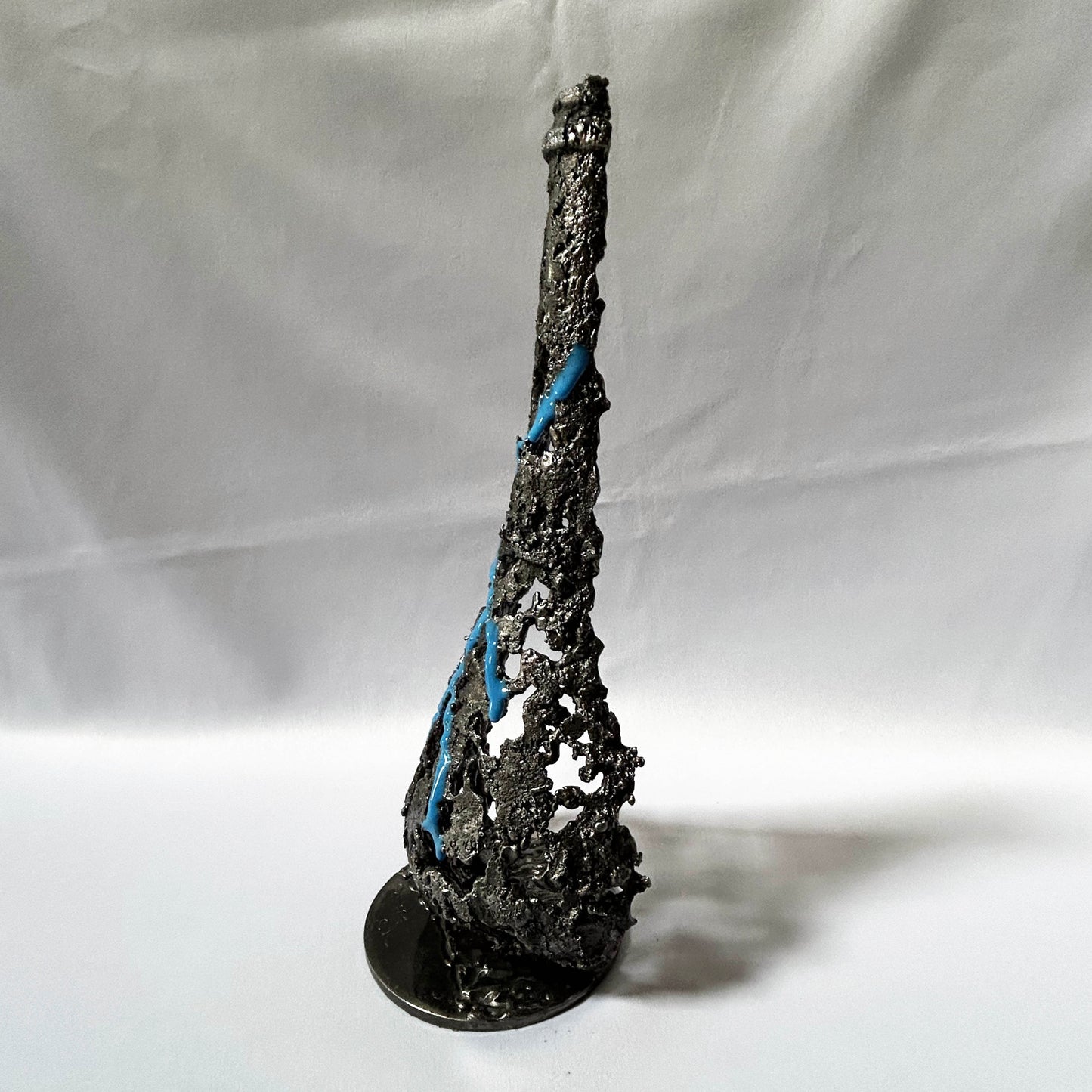 sculpture artistique bouteille champagne métal ajouré bleu