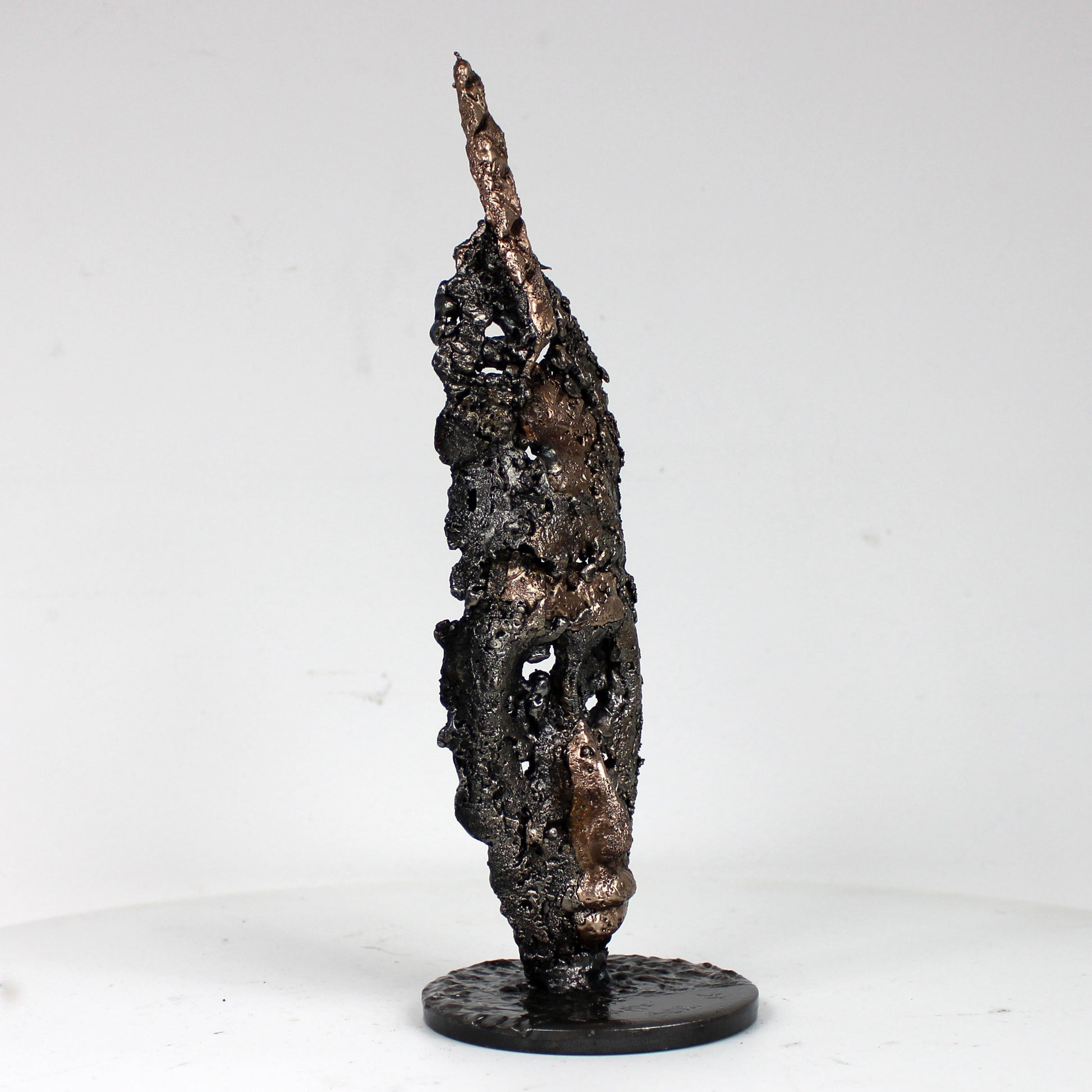 Sculpture visage africain stylisé acier bronze - vue de profil