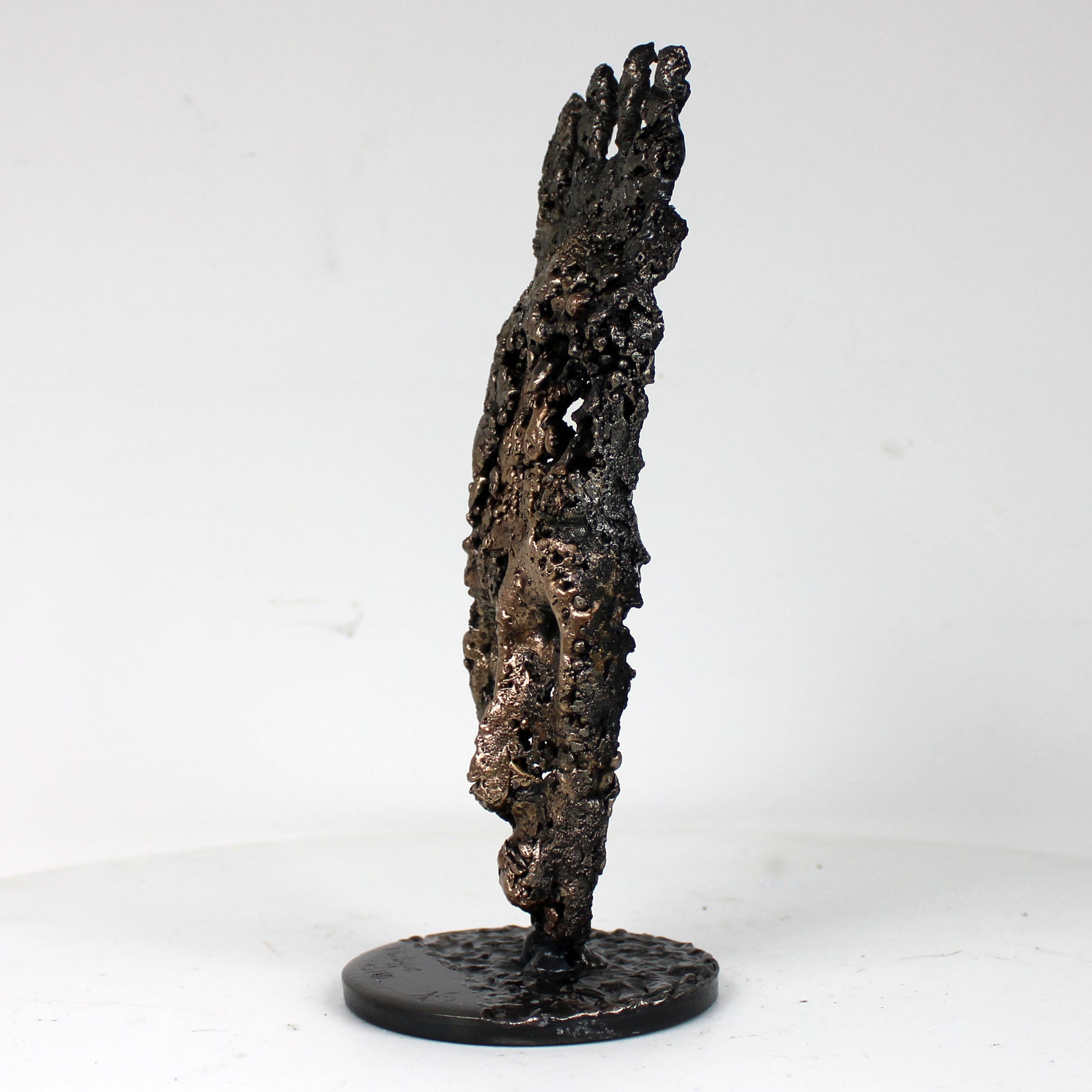 sculpture africaine diffusion lumière acier bronze - vue de profil