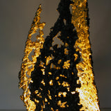 Flame Lamp II - Luminary sculpture - Flame in steel lace and 24 carat gold leaves
