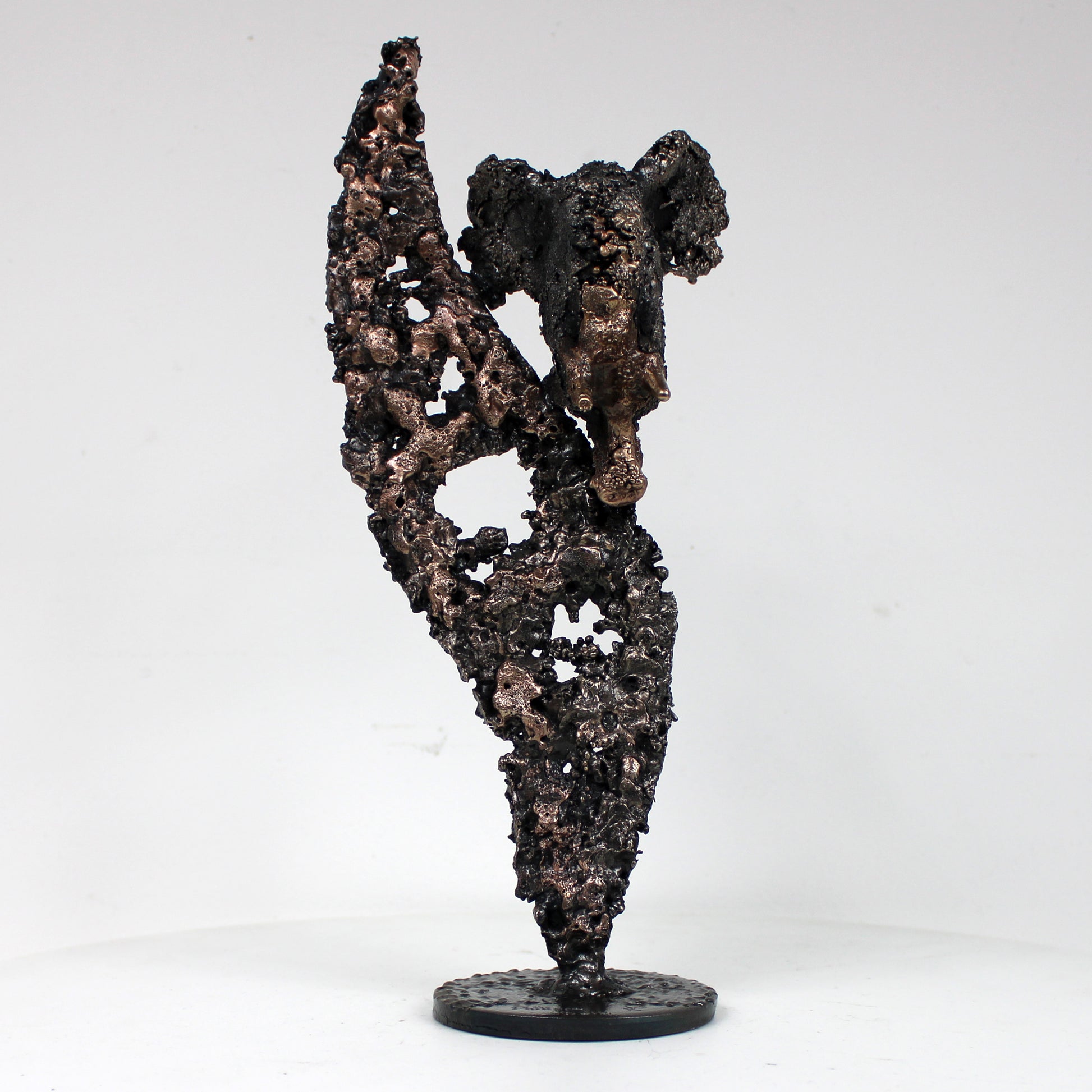 Flamme éléphant 30-23 - Sculpture animal metal - Tete elephant sur flamme acier bronze