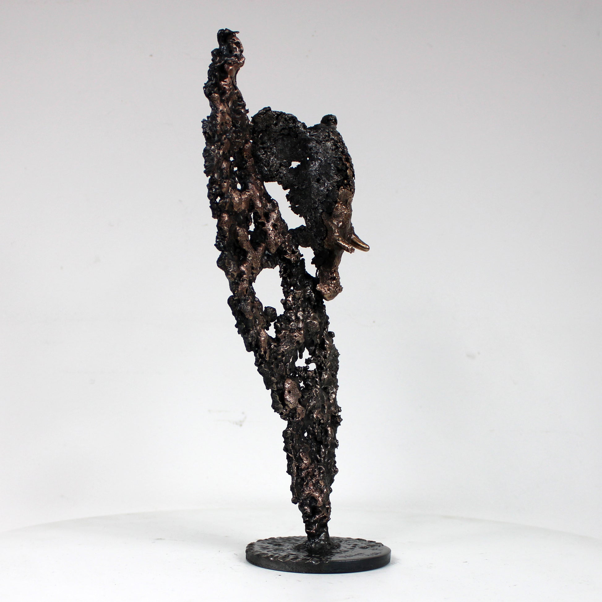 Flamme éléphant 30-23 - Sculpture animal metal - Tete elephant sur flamme acier bronze